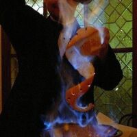 cognac, orange liqueur, cloves, cinnamon, sugar and citrus, finished with hot coffee